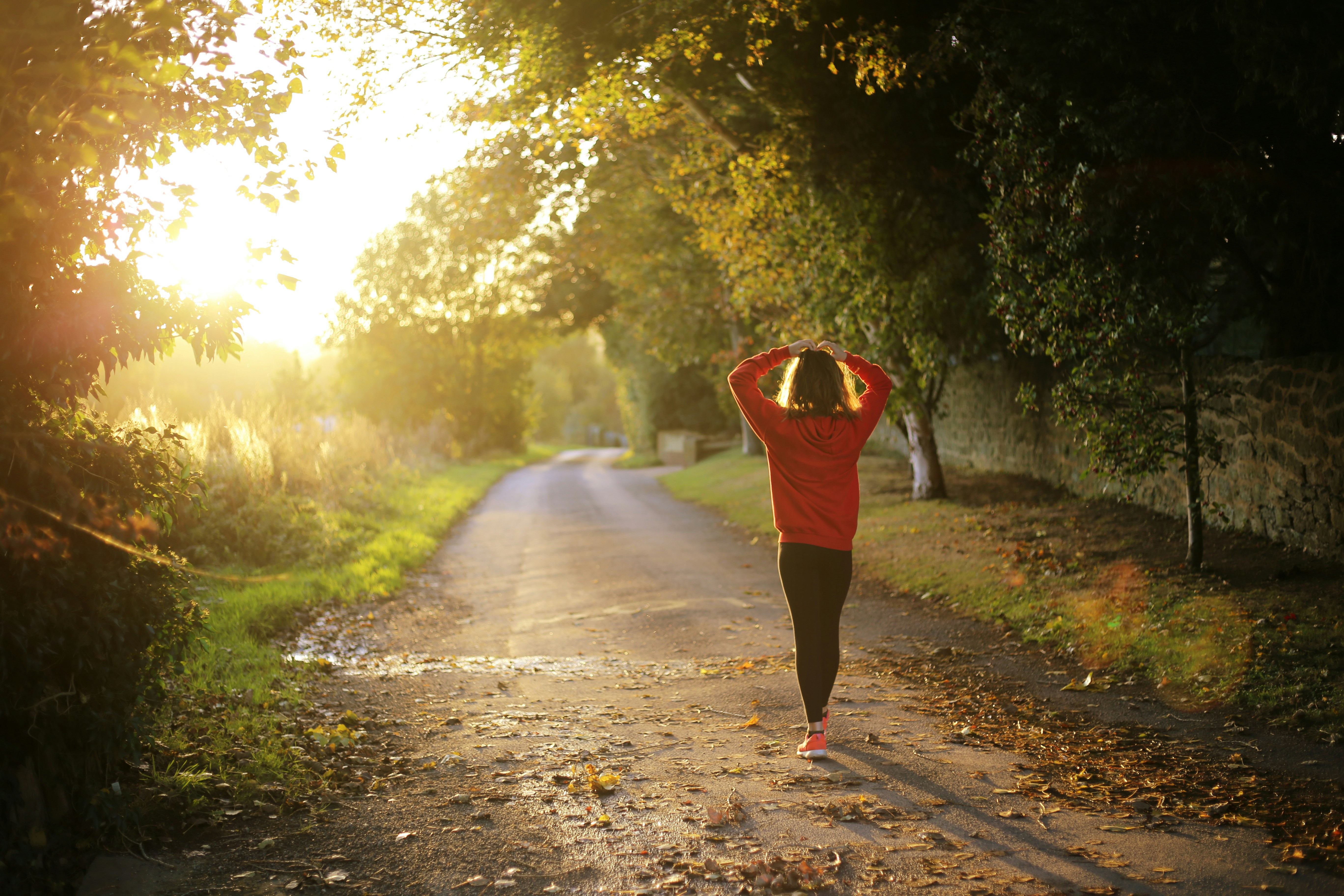 woman walking in the sun